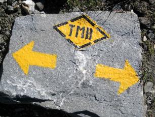 Tour du Mont Blanc sign on a rock